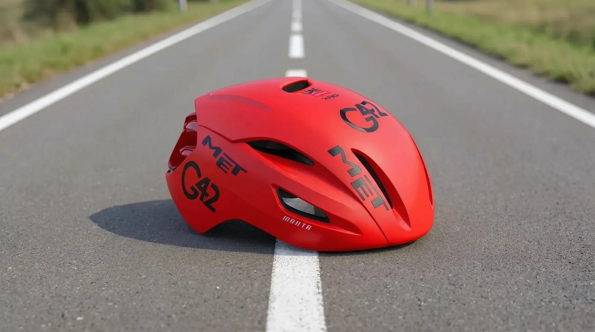 G42 race helmet on an open road